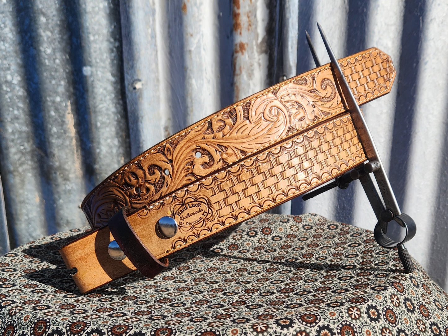 Feather tooled, basket stamped belt.
