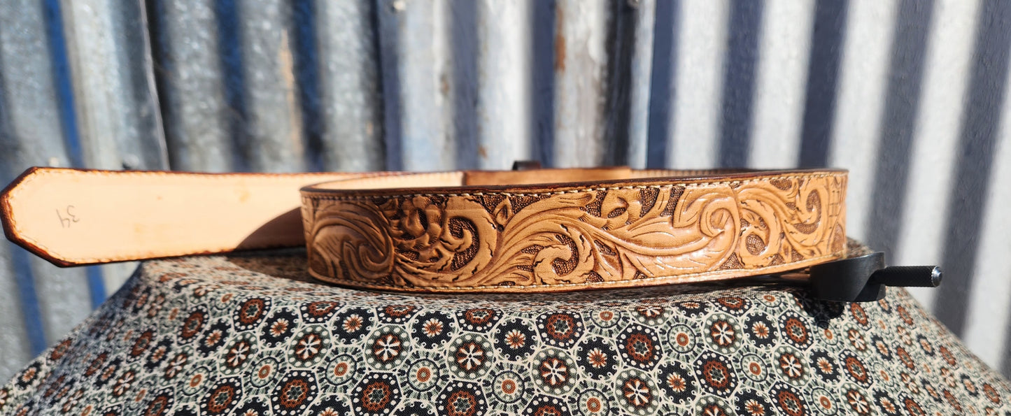 Feather tooled, basket stamped belt.