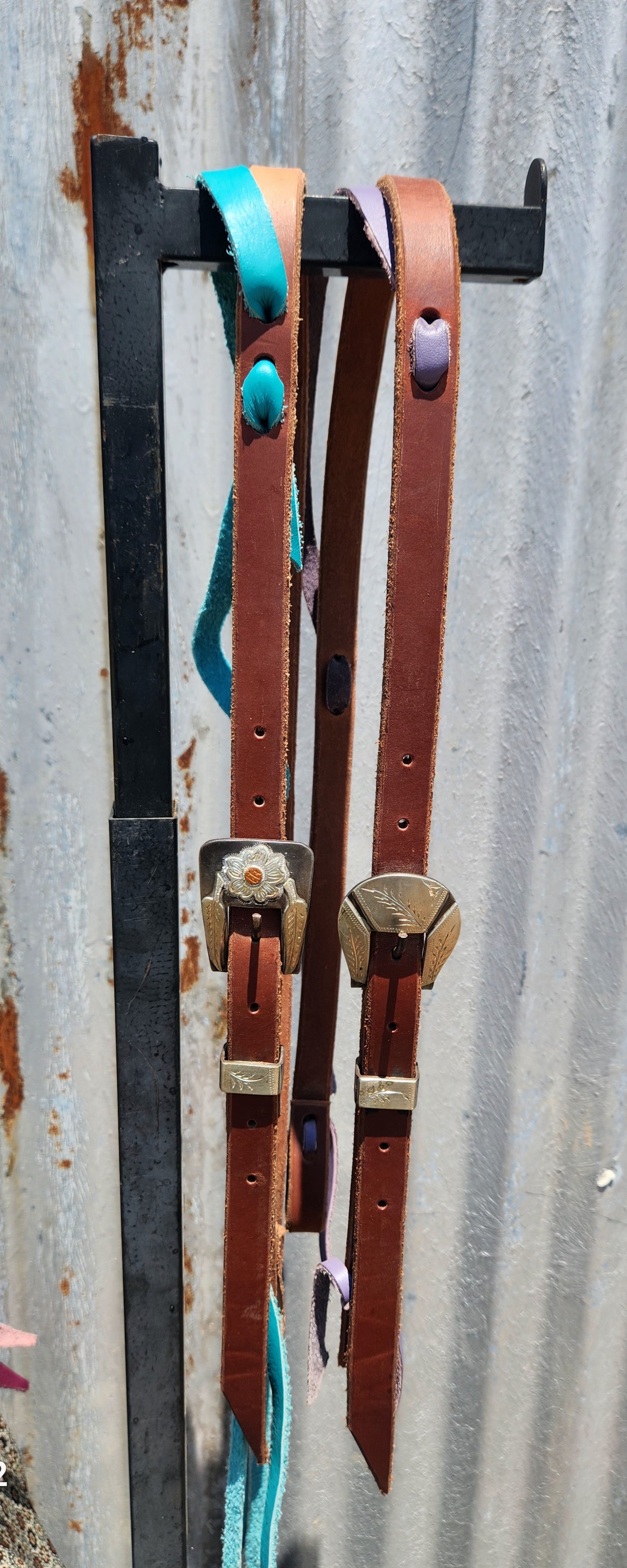 Harness leather headstalls with handmade buckles