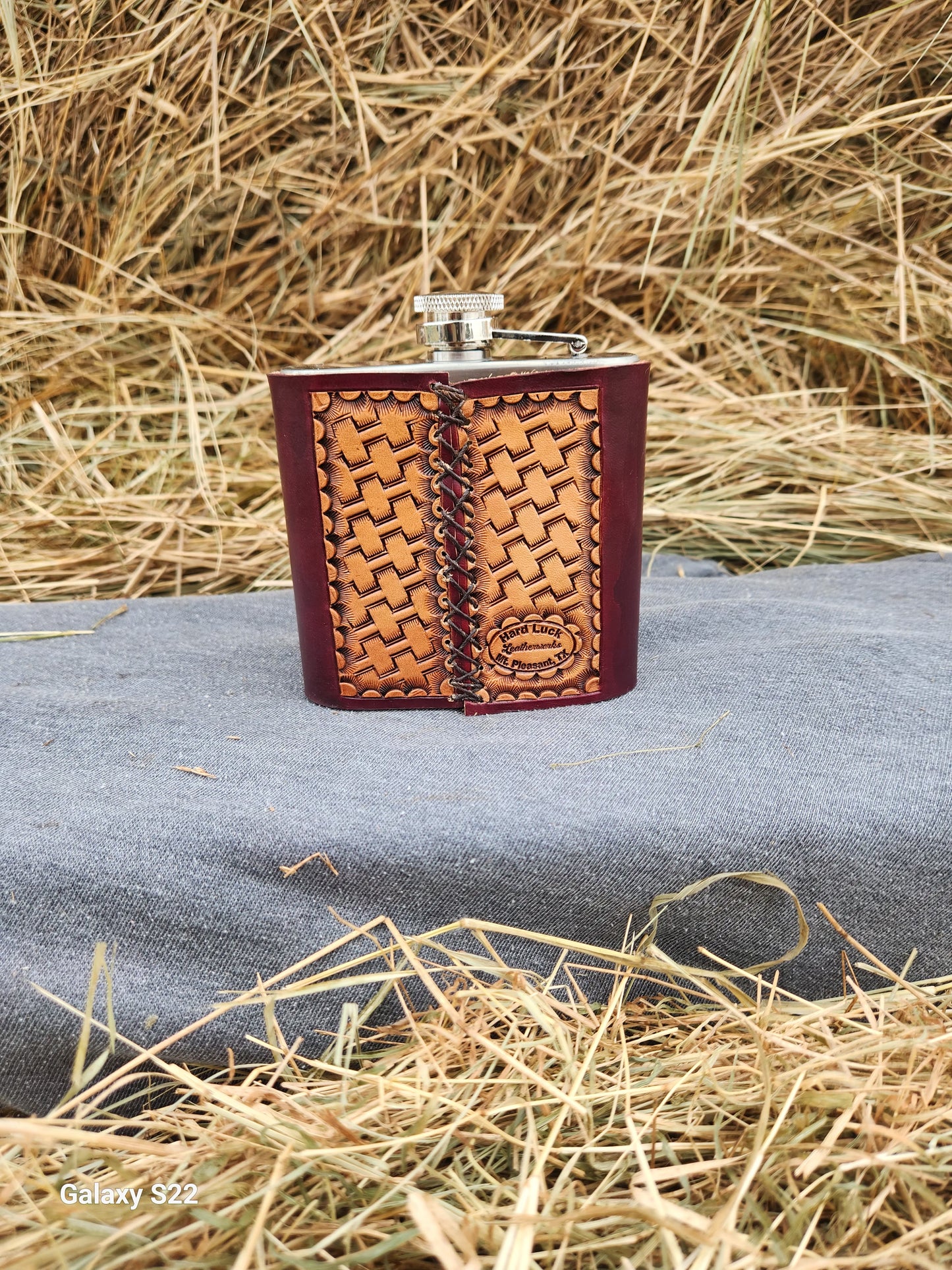 Tooled flask sleeve
