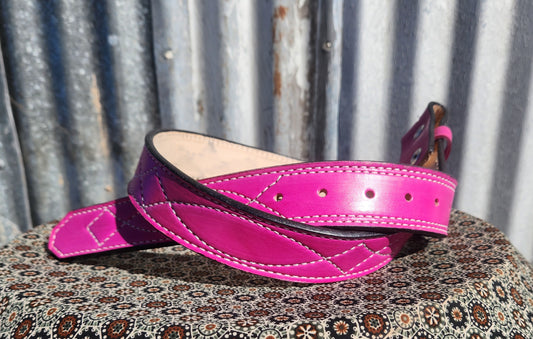 Bright pink gunslinger stitched belt.