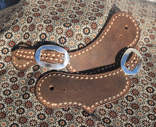 Buck stitched spur straps